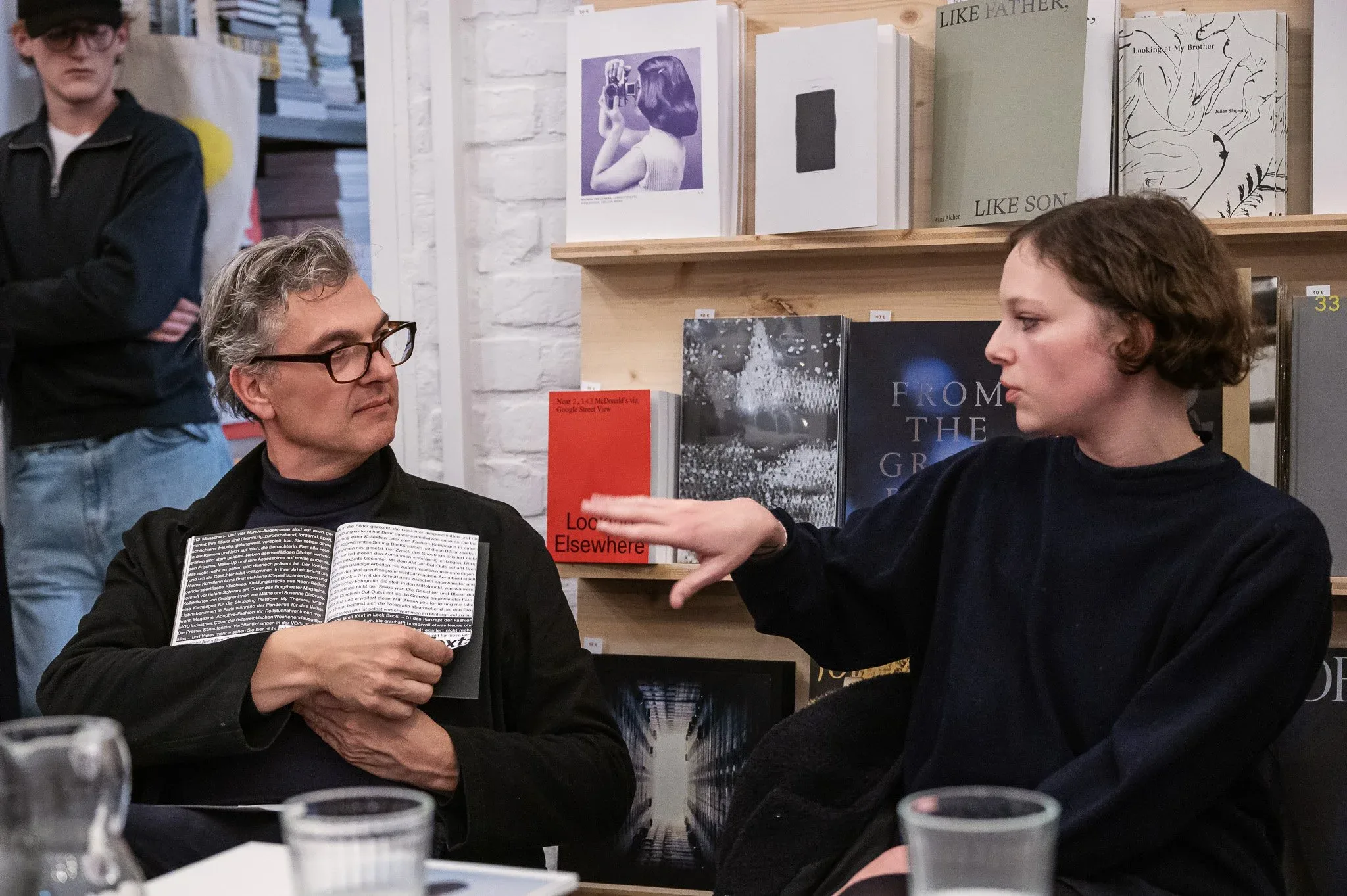Felix Hoffmann discussing with Anna Breit about her "Look Book 01"