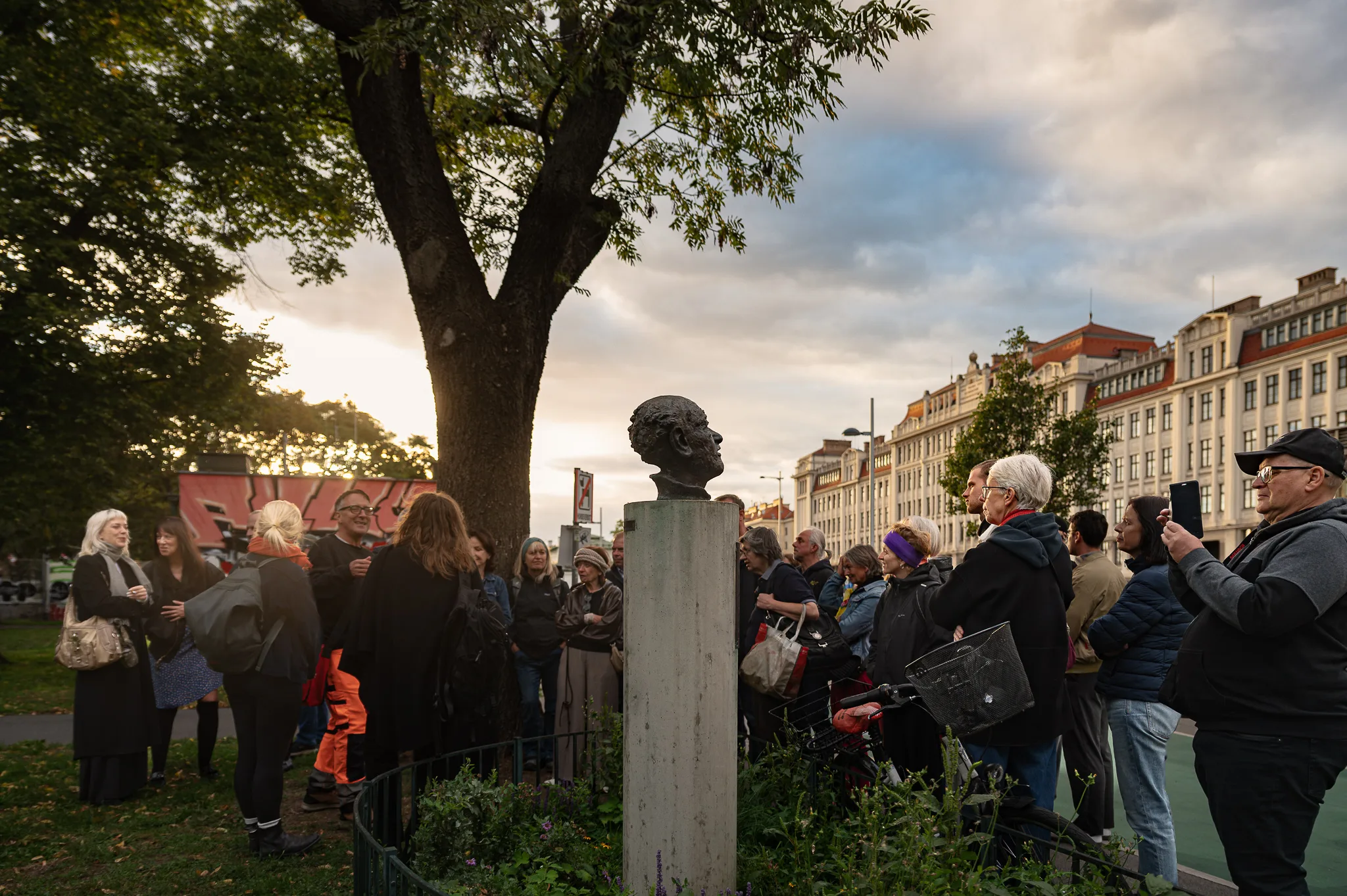 The group gathered around the Kreisky bust in Kreisky Park, “Bruno Kreisky on TOUR”, Vienna, 2026