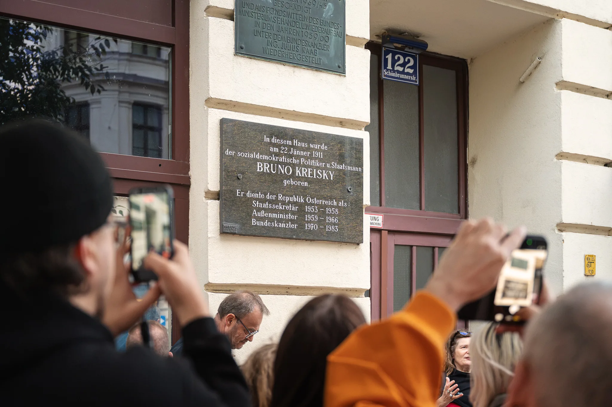 Photographing the plaque on Schönbrunner Straße 122, Bruno Kreisky's birthplace, Vienna, 2026
