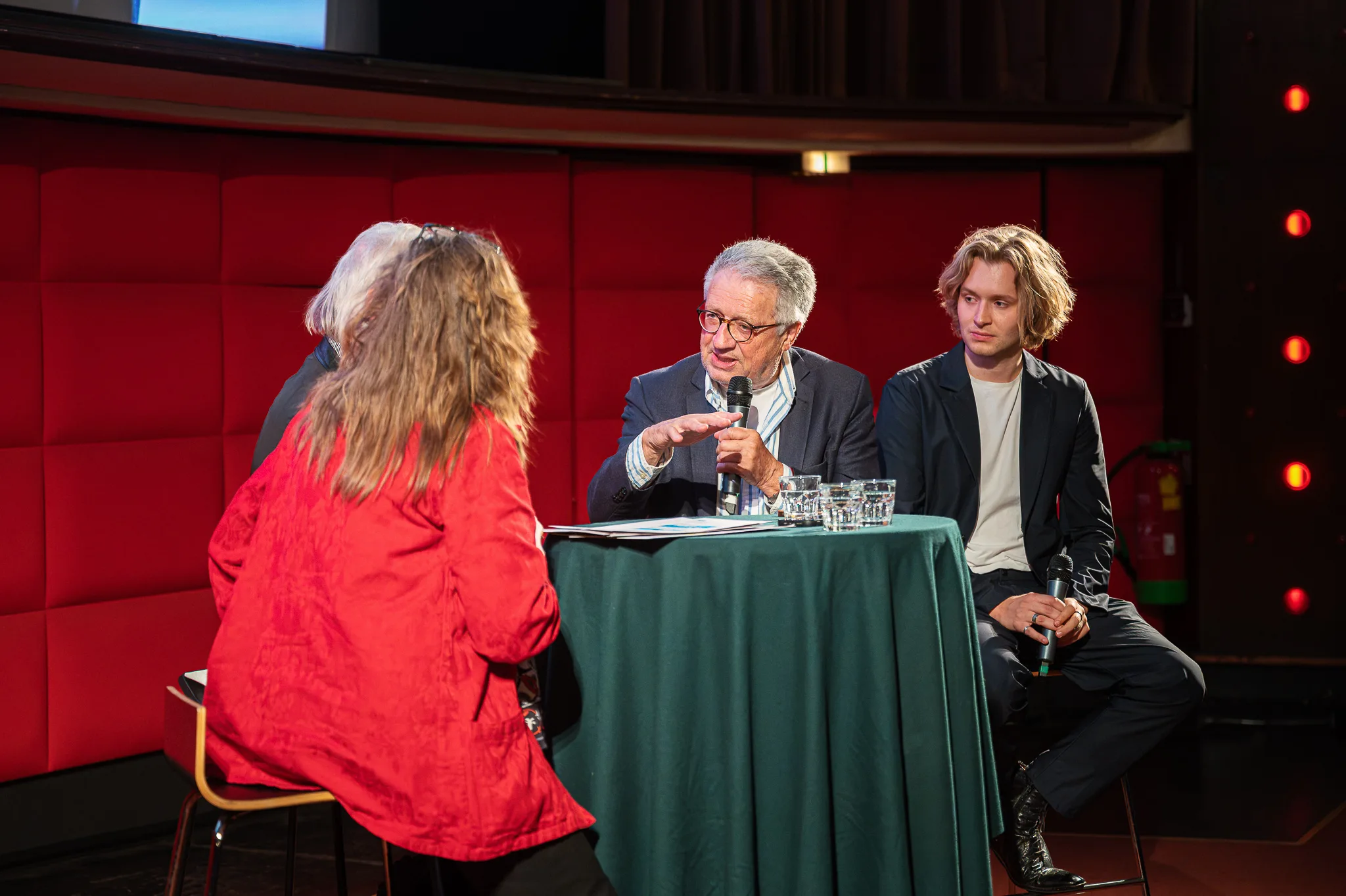 Wolfgang Petritsch speaking next to Nils Arztmann, Sabine Kroissenbrunner in front, Preview of “Bruno – Der junge Kreisky”, Filmcasino, Vienna, 2026